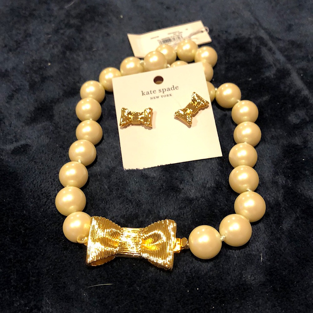 Pearl and bow earrings